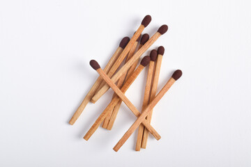 Wooden match isolated on white background. Piles of matchstick