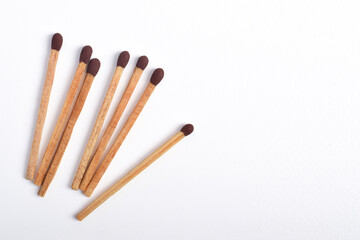 Wooden match isolated on white background. Piles of matchstick