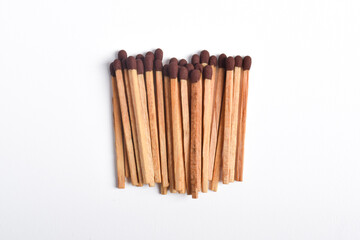 Wooden match isolated on white background. Piles of matchstick