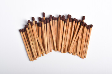 Wooden match isolated on white background. Piles of matchstick