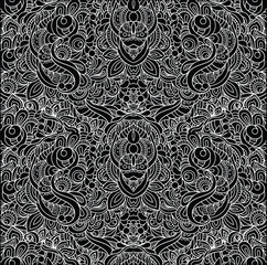 Intricate Black and White Floral Zentangle Pattern with Symmetrical Design Elements.