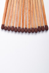 Wooden match isolated on white background, space fo text
