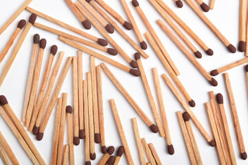 Wooden match isolated on white background. Piles of matchstick