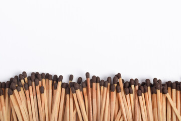 Wooden match isolated on white background, space fo text