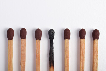 Burnt matches isolated on white background. Different stages of match burning Burnt matches.