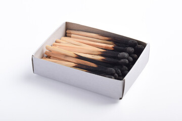 Burning matches in the matchbox isolated on white background. Box of matches.