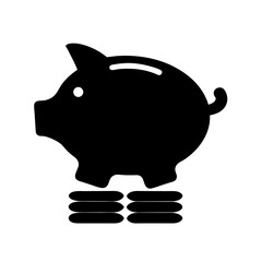 Black piggy bank with coins beneath it represents financial savings and planning
