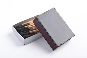 Burning matches in the matchbox isolated on white background. Box of matches.