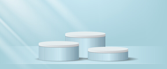Minimalist blue vector background with three striped cylindrical podiums and soft sunlight rays, ideal for product display, presentation, or cosmetic showcase.