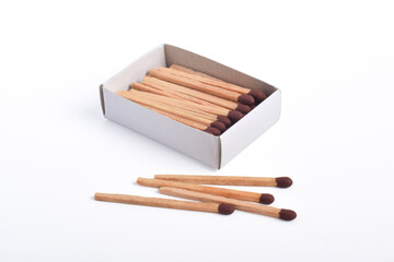 Box of matches isolated on white background, for ignition, safety, and household concept.