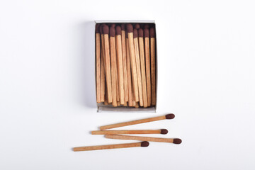 Box of matches isolated on white background, for ignition, safety, and household concept.
