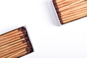 Box of matches isolated on white background, for ignition, safety, and household concept.
