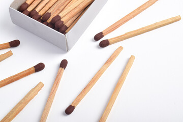Box of matches isolated on white background, for ignition, safety, and household concept.