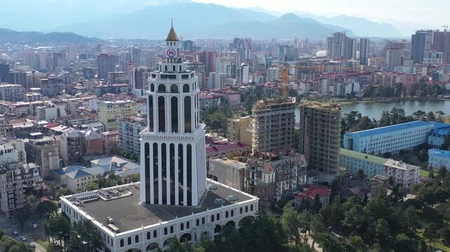 Batumi Georgia Aerial view of the city in the winter season with a view to green trees and hills and snow mountains