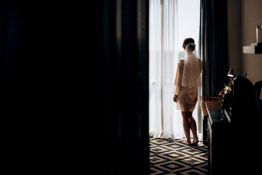 bride in a white dress at the training camp