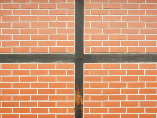 Symmetrical brick timber wall with clean structure. Ideal as background or texture. Copyspace