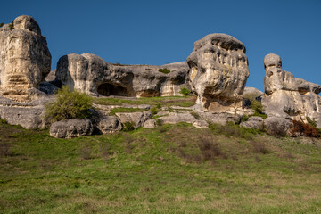 View of hills and cliffs against the sky.