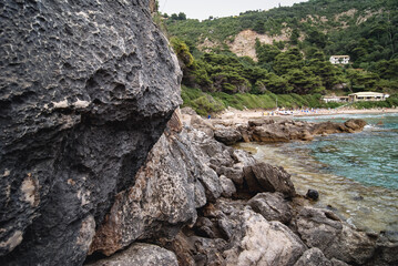 Rocks on Ionian Sea shore near Sinarades village on Corfu Island, Greece