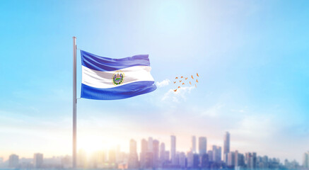El Salvador national flag waving with skyline and buildings. El Salvador national flag for independence day.
