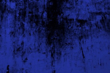 Close-up view of a blue textured wall showing rough patterns and intricate shadow details, offering a visually appealing background texture for versatile creative uses.