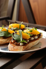 Gourmet Bruschetta with Orange Segments and Herbs