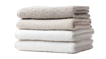 Stack of soft towels in neutral colors on a white isolated background.