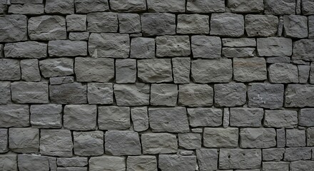 Fototapeta premium Rough textured grey stone wall pattern 