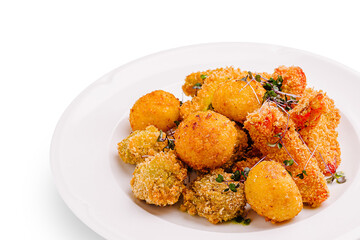 Deliciously crispy fried snacks served on a white plate at a casual gathering