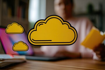 Person studying with cloud graphic overlay