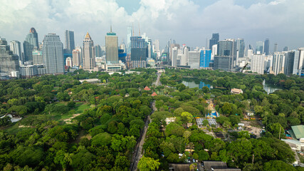 Aerial view modern office city building green tree park Lumpini public park downtown