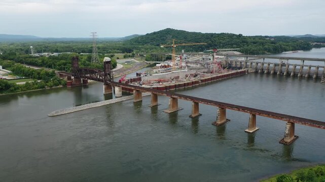 Stunning 4K drone footage of Chickamauga Dam, showcasing its structure, the Tennessee River, and scenic beauty. Perfect for infrastructure, travel, or history projects.