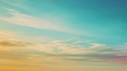 Fototapeta premium Colorful sunset sky over clouds, peaceful evening scene, background for design