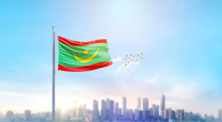 Mauritania national flag waving with skyline and buildings. Mauritania national flag for independence day.
