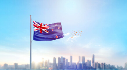 New Zealand national flag waving with skyline and buildings. New Zealand national flag for independence day.