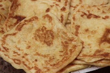 A close-up of the traditional Moroccan flatbread known as Msemmen or Msemen