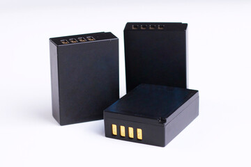 The battery charger is black on a white background.