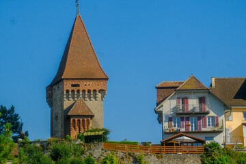 Fototapeta premium detail of a tower of the Chenaux Castle, a castle in the municipality of Estavayer-le-Lac of the Canton of Fribourg in Switzerland