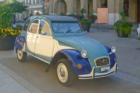 Avenches, Switzerland - august 08, 2025 : logo on a Dark light blue old Citro&euml;n 2cv