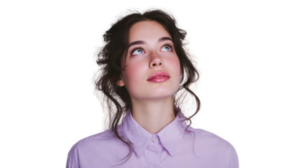 A young woman looking upwards with a thoughtful expression, captured on a white isolate background.