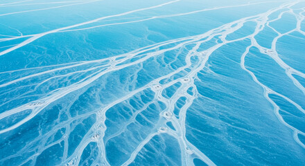 Obraz premium Clear ice background with natural frost patterns. Cold winter lake texture for arctic adventure. Frozen water surface for nature travel.