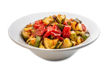 Sauteed zucchini and tomato pieces in white plate isolate