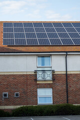Fototapeta premium solar panels on the roof, sun energy system. Green energy