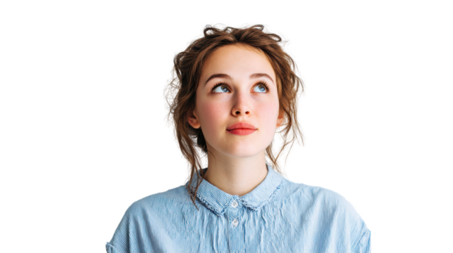 Young woman looking up, thoughtful expression, studio shot, isolated on white background.