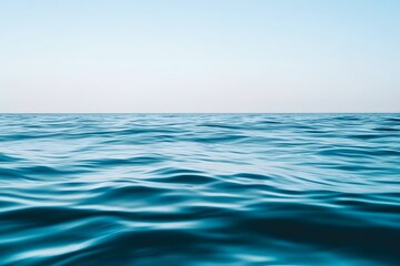 Obraz premium Deep ocean surface texture with light reflections, clean horizon, abstract peaceful sea backdrop