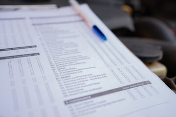 Car inspection concept with checklist, automotive maintenance and repair service concept.