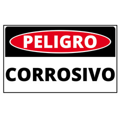 Peligro corrosivo sign on a white background (trad. danger corrosive )