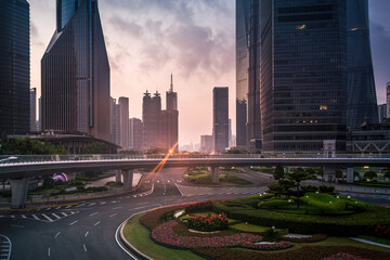 Modern Urban Cityscape with High-rise Buildings and Empty Road
