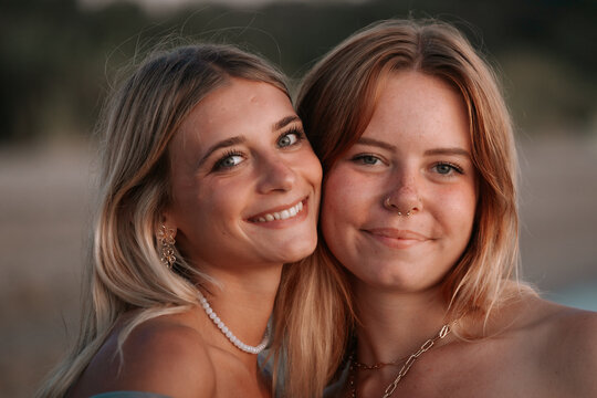 Best friends enjoying sunset at the beach on Thassos Island
