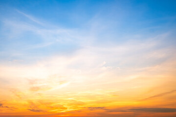 Beautiful , luxury soft gradient orange gold clouds and sunlight on the blue sky perfect for the background, take in evening,Twilight, Large size, high definition landscape photo