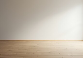 Empty interior space with wooden floor, a blank wall, and natural light.